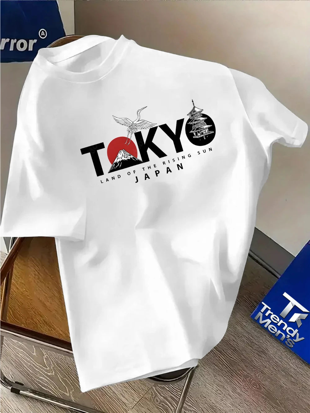 Graphic T-shirts for men, featuring a Tokyo theme with sunrise and torii gate design